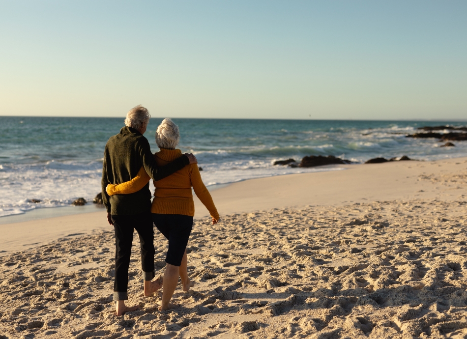 Couple walking on beach