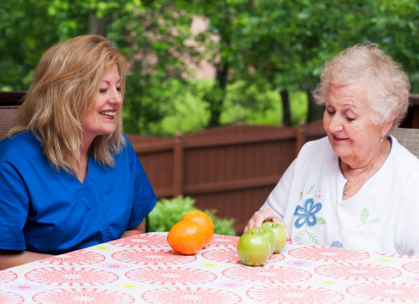 Woman having speech language assessment for aphasia