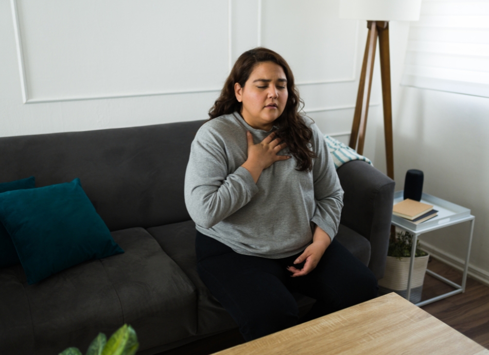 Woman trying to calm herself through panic